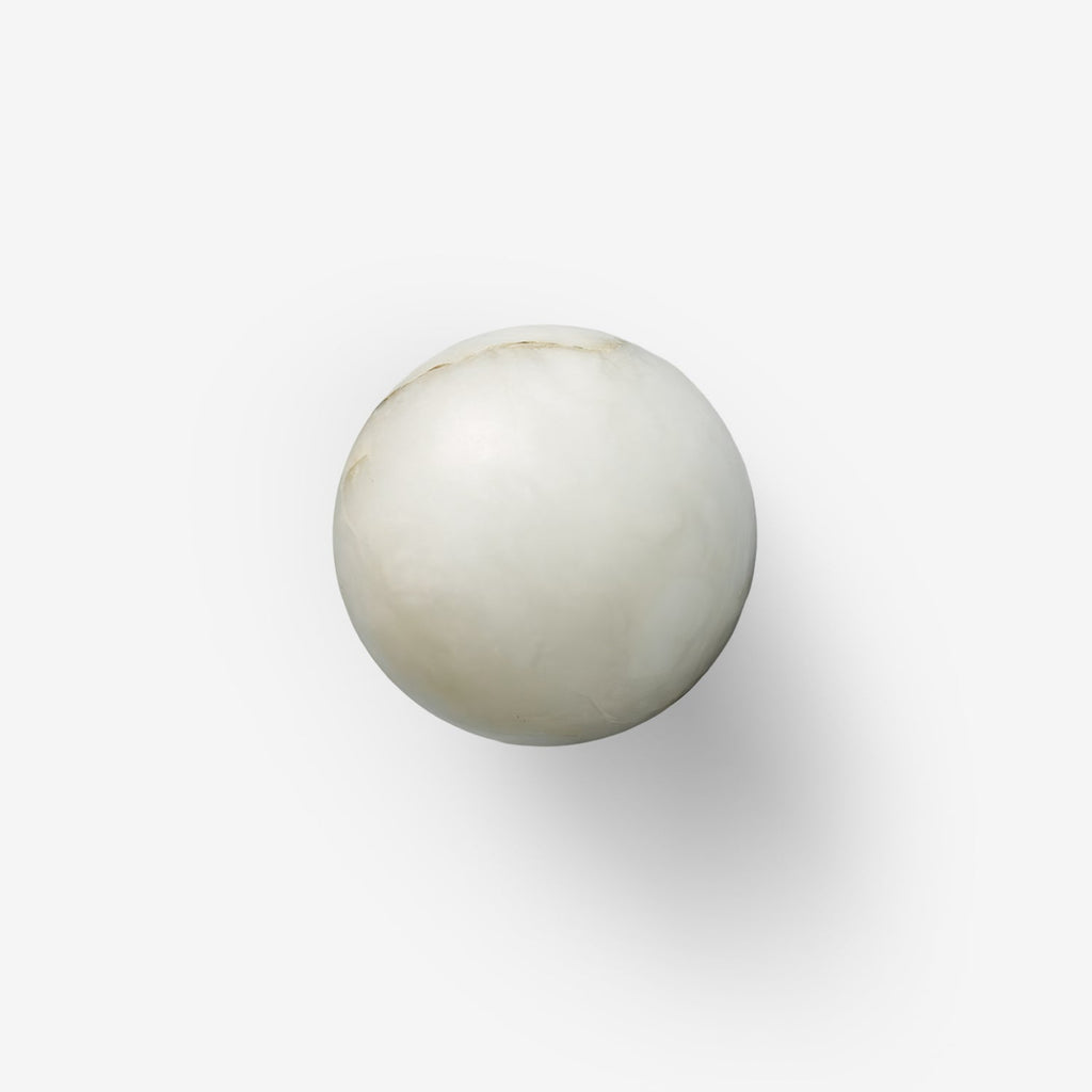Alabaster Mini Orb wall sconce with gold metal body and white globe shade