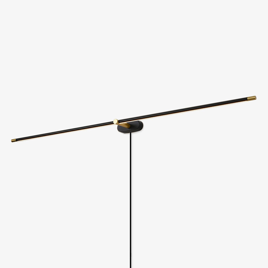 Minimalist linear LED wall sconce with black body and white shade