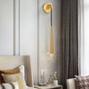 brass-cone-wall-lamp