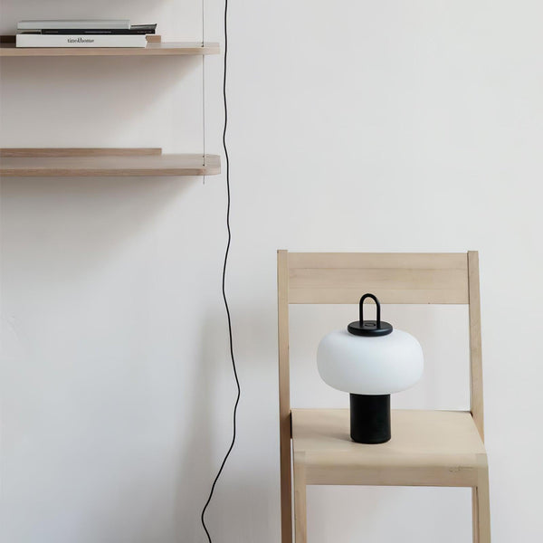 black metal glass table lamp with handle for bedside reading