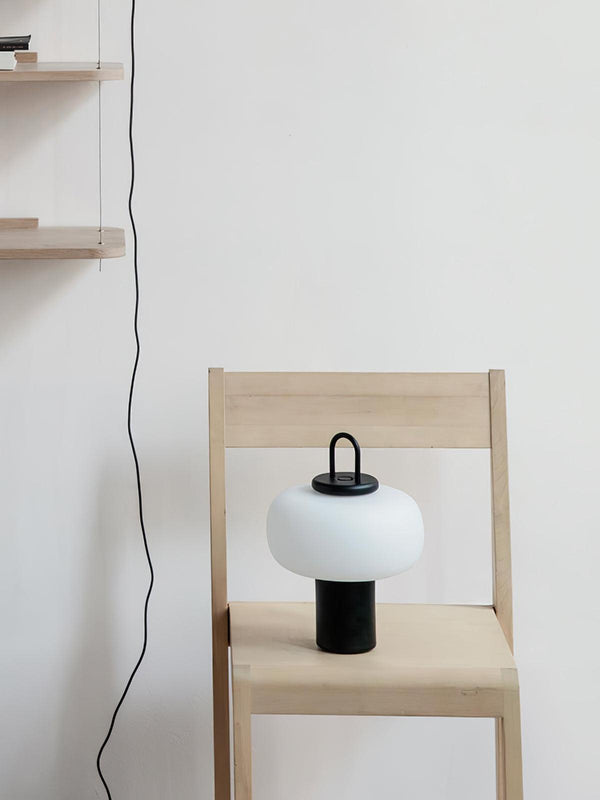 black metal glass table lamp with handle for bedside reading