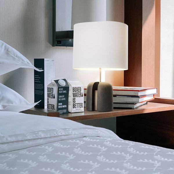 black resin table lamp with white fabric shade for bedside