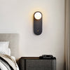black travertine cylinder wall sconce white glass