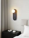 black travertine cylinder wall sconce white glass
