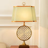 blue fabric shade gold table lamp for bedroom reading nook