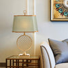 blue fabric shade gold table lamp for bedroom reading nook