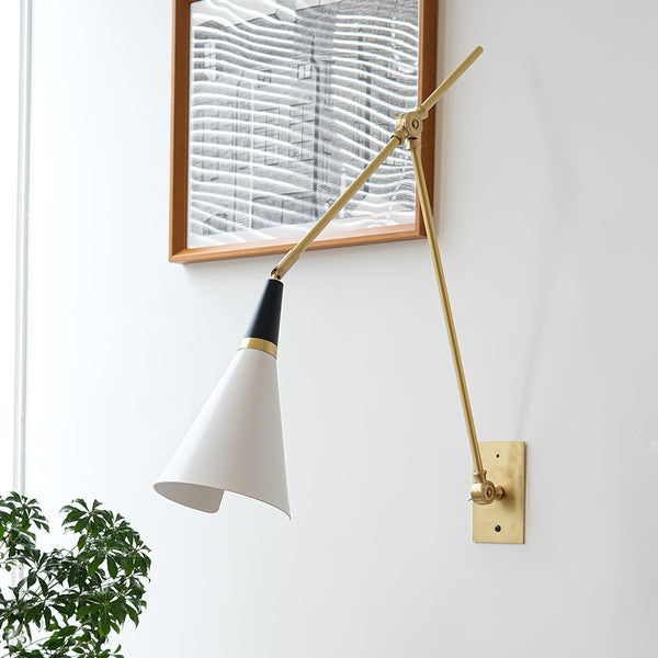 brass swing arm wall lamp with aluminum shade for bedroom and reading nook