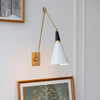 brass swing arm wall lamp with aluminum shade for bedroom and reading nook