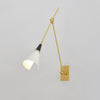 brass swing arm wall lamp with aluminum shade for bedroom and reading nook