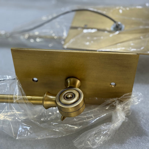 brass swing arm wall lamp with aluminum shade for bedroom and reading nook