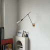 brass swing arm wall lamp with aluminum shade for bedroom and reading nook