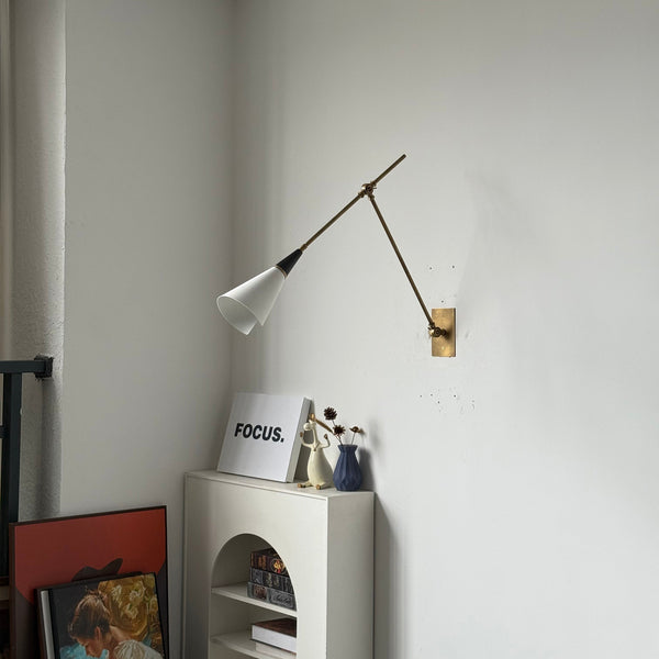 brass swing arm wall lamp with aluminum shade for bedroom and reading nook