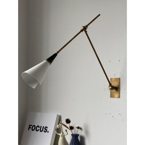 brass swing arm wall lamp with aluminum shade for bedroom and reading nook