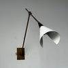 brass swing arm wall lamp with aluminum shade for bedroom and reading nook