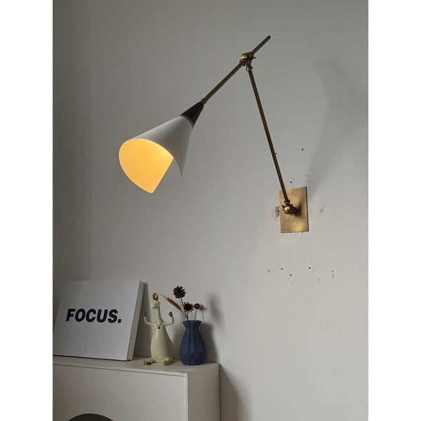 brass swing arm wall lamp with aluminum shade for bedroom and reading nook