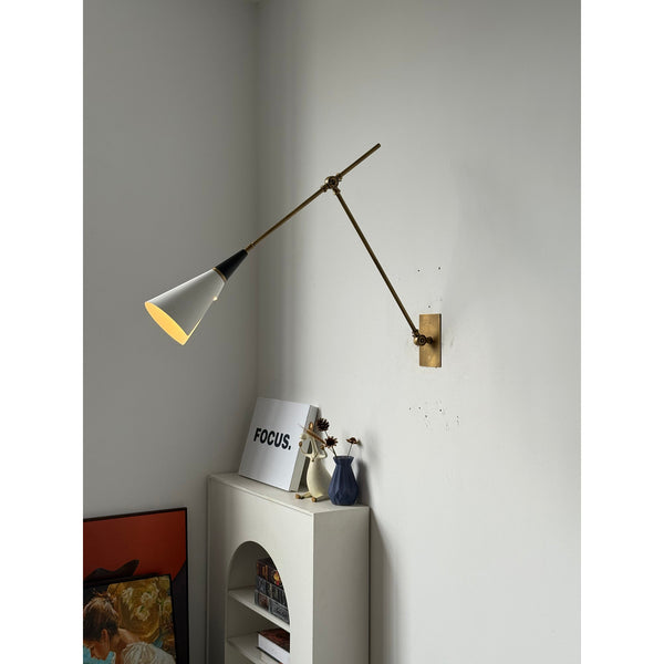 brass swing arm wall lamp with aluminum shade for bedroom and reading nook