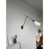 brass swing arm wall lamp with aluminum shade for bedroom and reading nook