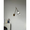 brass swing arm wall lamp with aluminum shade for bedroom and reading nook