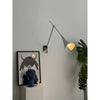 brass swing arm wall lamp with aluminum shade for bedroom and reading nook