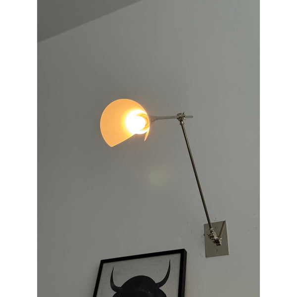 brass swing arm wall lamp with aluminum shade for bedroom and reading nook