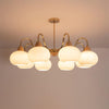 cream glass persimmon chandelier gold wood dining room