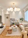 cream glass persimmon chandelier gold wood dining room