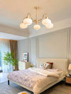 cream glass persimmon chandelier gold wood dining room