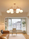 cream glass persimmon chandelier gold wood dining room