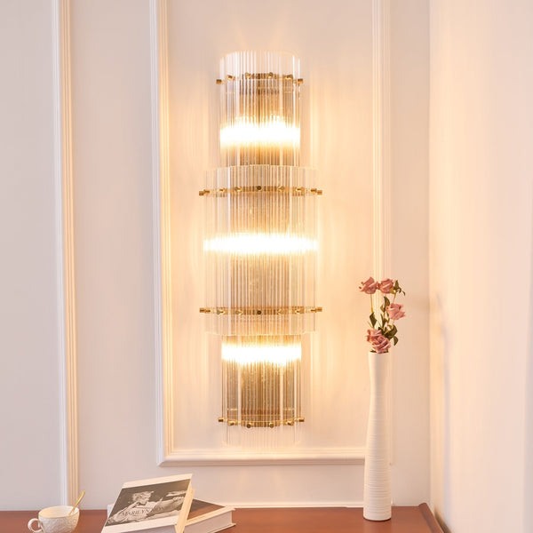 modern brass clear glass rod wall light