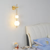 modern brass glass globe plug in wall lamp