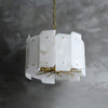modern brass tiered alabaster chandelier