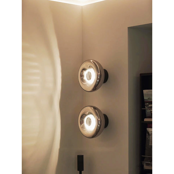 modern chrome glass void surface sconce