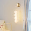 modern gold iron opal glass abacus wall sconce