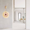 modern gold travertine disc led wall sconce