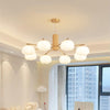 modern gold white cotton ball chandelier