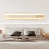 modern honed yellow travertine sculptural led wall sconce