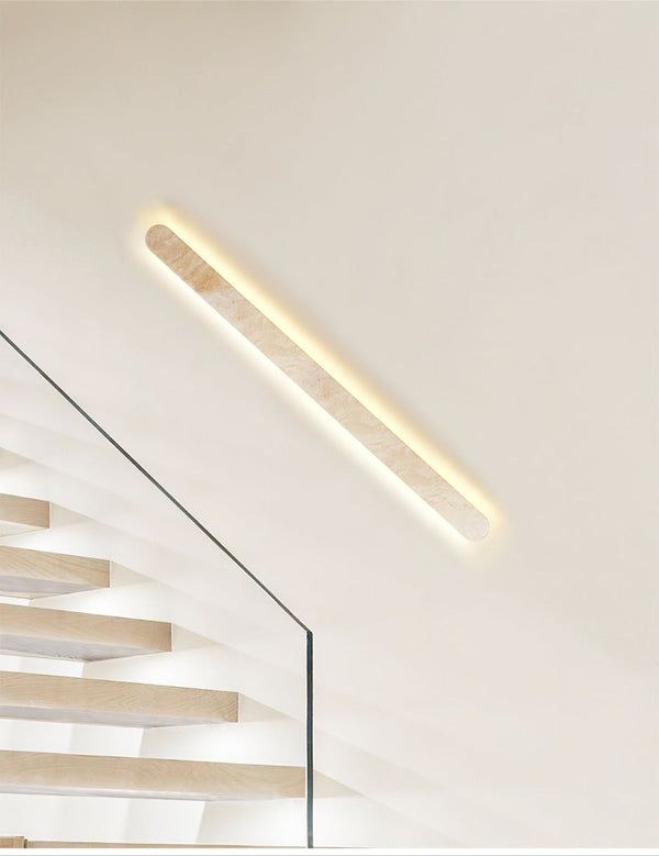 modern honed yellow travertine sculptural led wall sconce