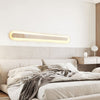 modern honed yellow travertine sculptural led wall sconce