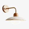 modern travertine disc wall sconce black gold