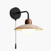 modern travertine disc wall sconce black gold