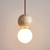 modern travertine frosted glass globe pendant light