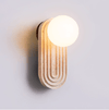 modern yellow travertine arch wall sconce