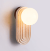 modern yellow travertine arch wall sconce
