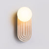 modern yellow travertine arch wall sconce