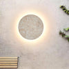 modern yellow travertine circle led wall sconce