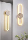 modern yellow travertine disc led wall sconce