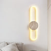 modern yellow travertine disc led wall sconce