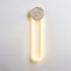 modern yellow travertine disc led wall sconce