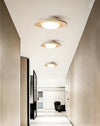 modern yellow travertine elliptical flush mount ceiling light