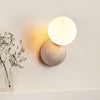 modern yellow travertine glass globe wall sconce 2